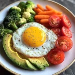 Sunny-Side Egg with Avocado, Tomatoes & Steamed Veggies